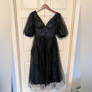 Black tulle dress with gold and silver stars and moon embellishments